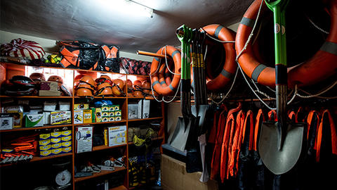 room with life preservers and safety equipment