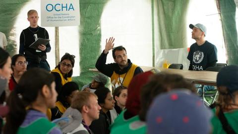 Students during a simulated UNOCHA meeting
