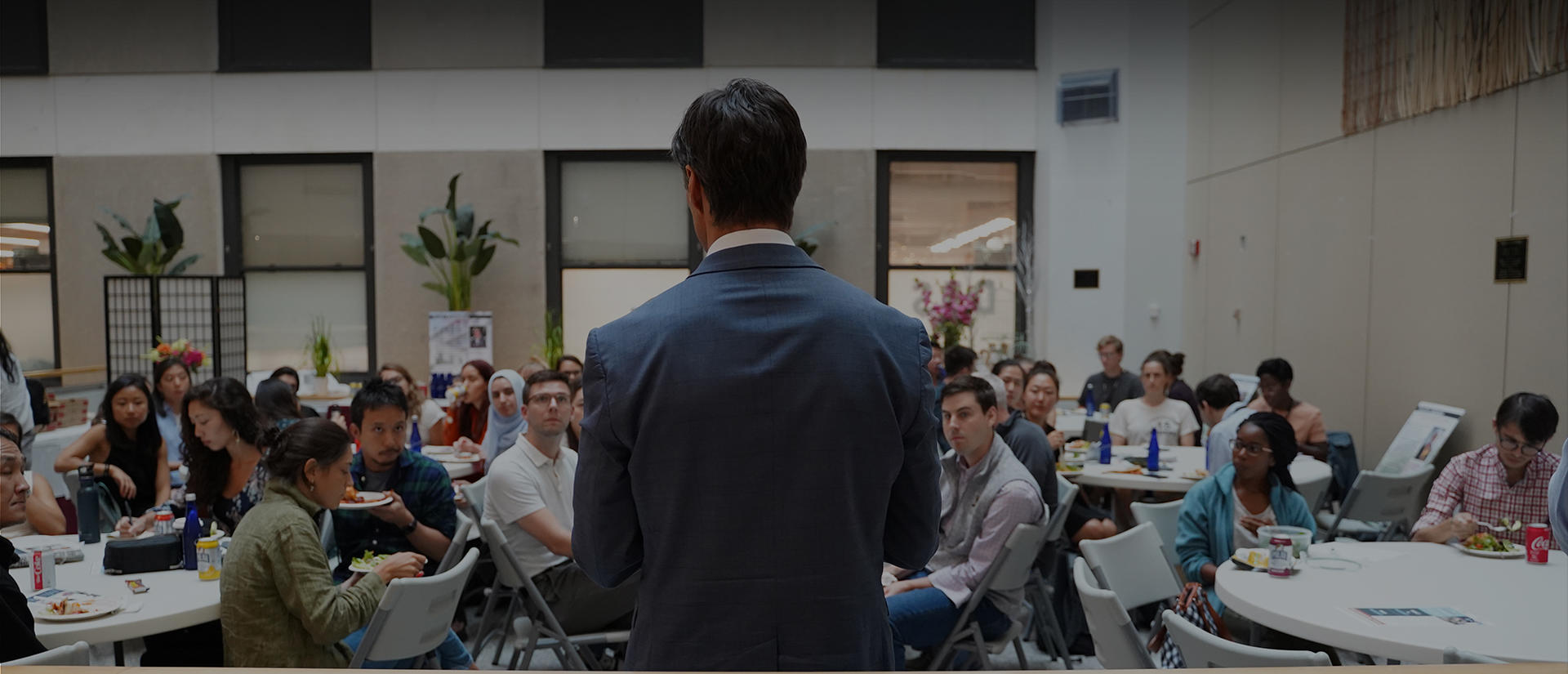 man speaking at conference