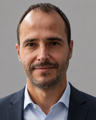 Christos Christou smiling