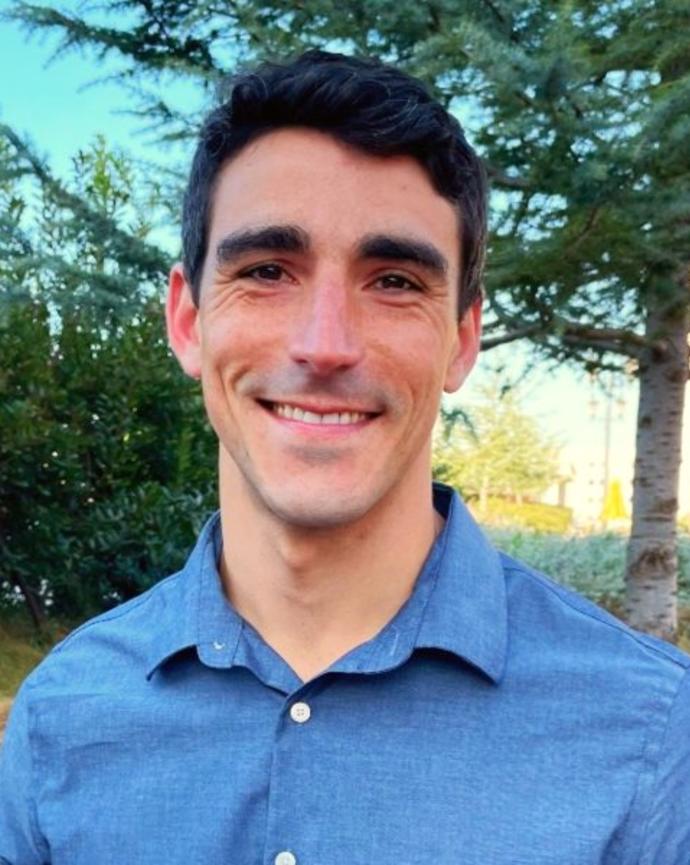 Sam Lewis smiling